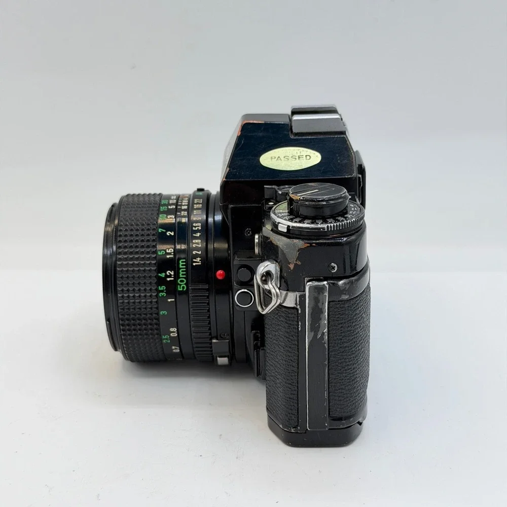 Canon A-1 35mm Film SLR Camera with FD 50mm f/1.4 Lens 1980 Olympics Cap Black